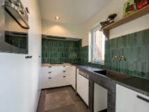 Spacious Holiday Home with Pond in Poperinge