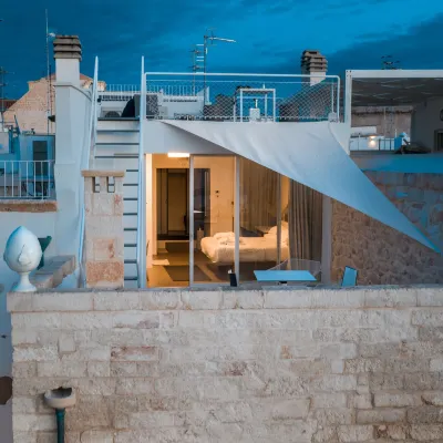 Antico Mondo Rooms & Suites Hotels near Lama Monachile