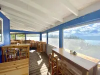 The Sunset Cove and Rainbow Room Hotels in Alice Town