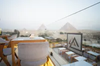 جريت بيراميد ان فنادق في نزلة السمان