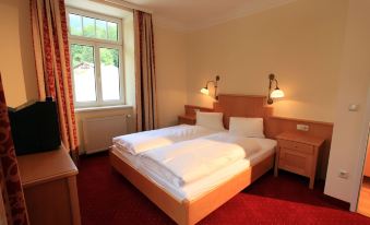 Romantik Residenz (Ferienwohnungen Hotel Im Weissen Rössl) - Dependance