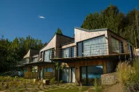 Correntoso TownHouses Hoteles cerca de Vivero Genciana