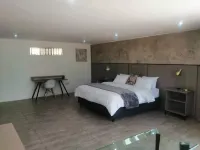 Room 1 of 8 Cozy Suites the Hilltop Guesthouse - Lodges
