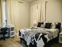 Modern 2-bed, 2-bath home with WiFi, Smart TVs, coffee, tea, and cereal included