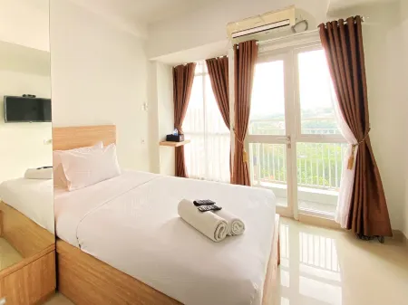 Warm and Cozy Studio at Taman Melati Jatinangor Apartment Отели в г. Tanjungsari