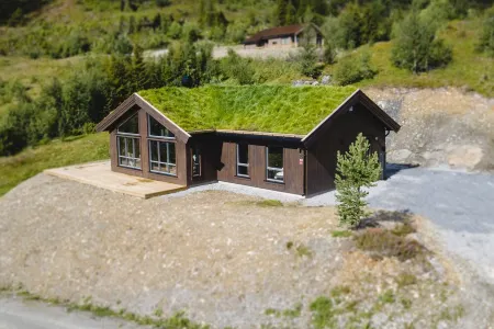 Modern ski-in/ski-out cabin in Norway – all included for your mountain getaway Отели в г. Нур-Эурдал
