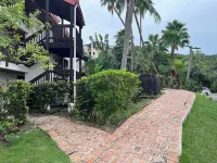 Paradise Awaits! Ground level unit with incredible views, pool, & beach access!