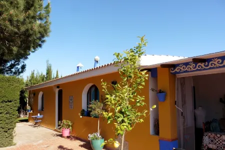 Comfortable apartment and swimming pool in the shade of the pine forest of Chipiona Отели рядом с достопримечательностью «Playa de la Costilla»