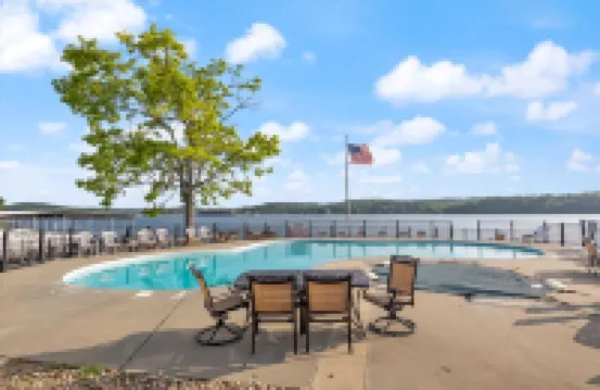 Expansive Views and Community Pool - Stunning Lakefront Oasis