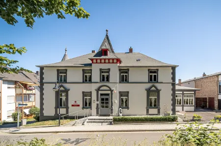 Le Petit Palais - Hotel/Pension Отели в г. Гарц