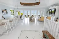 Serene waterfront house w pool, dock & beautiful sunsets - 5 min walk to beach.