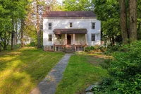 Relax in Style at Historic Modern on Main With Modern Amenities & Wooded Views