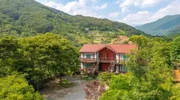 Hadong Hwadam Pension Hotels near Hwagaejangteo Market