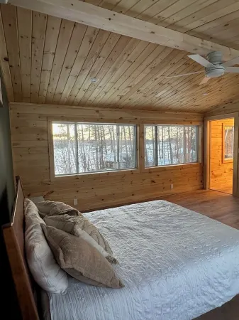 5 bed 4 bath in the Basin of Sebago Lake with 200 ft. of shared beach frontage