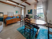 Farmhouse by Lauwers River with Rowing Boat - Apartments