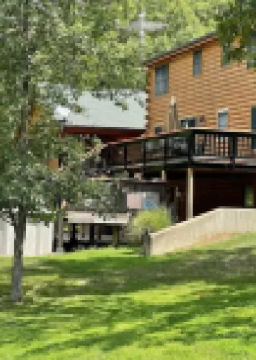 Real Log Cabin with Seasonal Pool and Hot Tub near Blue Springs Ranch