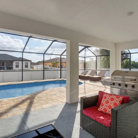 Furnished Lanai & Yard: Comfy Lehigh Acres Getaway