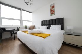 Sleek urban retreat with gym access