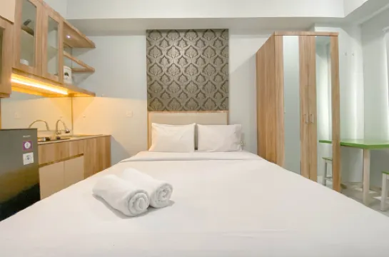 Basic Studio at Candiland Apartment By Travelio