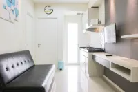 Simply 2BR Apartment at Parahyangan Residence By Travelio