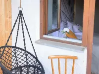 Berghupferl-Alm mit Wellnessoase im Garten Hotels in Flintsbach am Inn