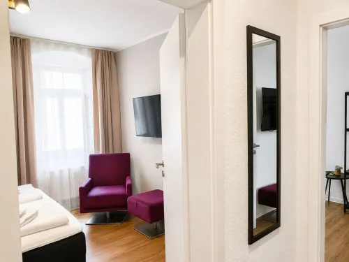 Central apartment for 4 people with kitchen, WiFi & private parking space