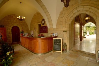 Front Desk St. George’s Cathedral Pilgrim Guesthouse – Jerusalem Photo