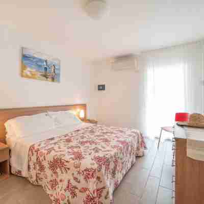 Sunny getaway with a beautiful terrace in Lignano Rooms