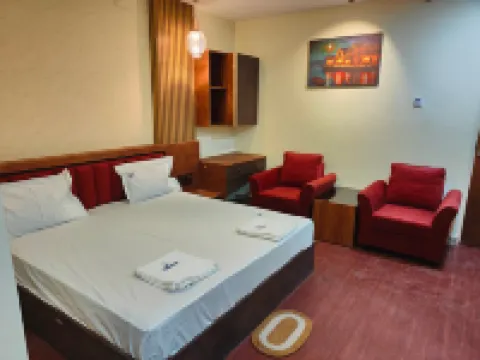 Hotel Geetha International Hotels near Arulmigu Sri Irukkankudi Mariamman Temple