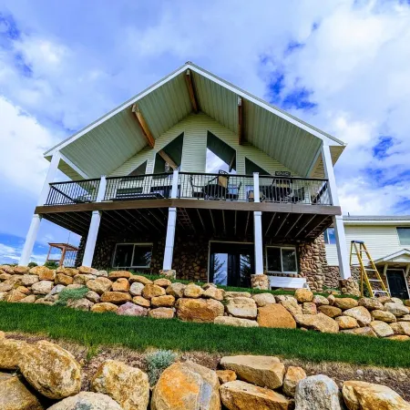 Golf Course Lakehouse with fantastic views of the lake, mountains & golf course.
