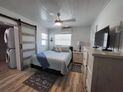 Hidden Gem! Treasure Island Waterfront 2/2 with a pool and dock!