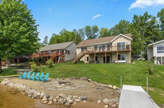 Canadian Lakes Lakefront Home with Breathtaking Sunrises and a Hot Tub!