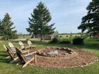 Our Thunder Moon Farm Stay- sleeps 7, framed by wildflowers. 4 miles to GB.