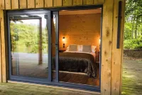 Woodland Cabin with Private Lake, Sauna + Fire Pit