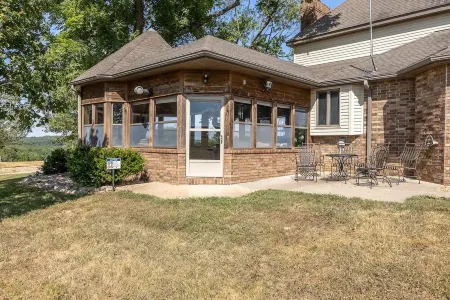 A spacious finely-appointed luxury hideaway, nestled in the Ozark Mountains.