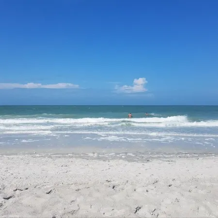 August Rates Lowered! Beach Lounges and Umbrella Service Included!