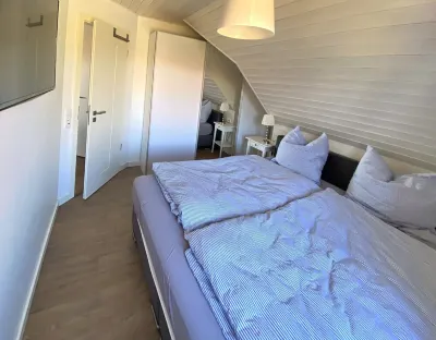 Exclusive apartment with large roof terrace near the beach with sauna Hotels near Spöölstuv - Tourismus-Service Langeoog