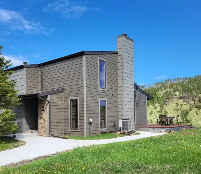 A beautiful mountain lake setting located in the 'Heart of the Black Hills'