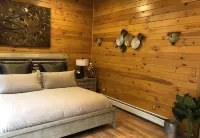 Spectacular Catskill Mountain River Front Custom Log Home