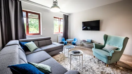 A11 Apartments & SPA Dermique Отели рядом с достопримечательностью «Adam Mickiewicz statue»