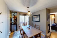 Ski slope-view condo on Gore Creek with fireplace - walk to Vail Village