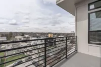 Spacious Living Area and Fully-Equipped Kitchen - Elegant Urban Retreat