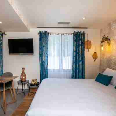 曼達拉海灘的傢俱齊全的開間拉叢林套房 Rooms