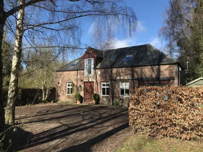 The Coach House at Riverlea Отели в г. 