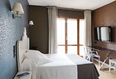 Hospedium Hostal Un Punto Chic Hotel di Huesca
