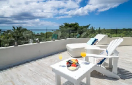 7 Mile Beach private Beach Club, ocean views from Roof deck and Pool Pavilion