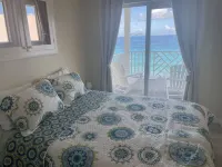 Spectacularly situated Beach Front  High Tide@ The Tides  at Little Apple Bay. Hotels in Tortola