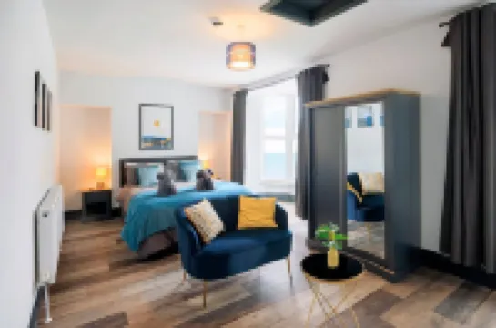 Large seafront apartment with balcony, parking and sea views