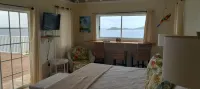 A true oceanfront villa with amazing sunsets and pool. Very nice location.