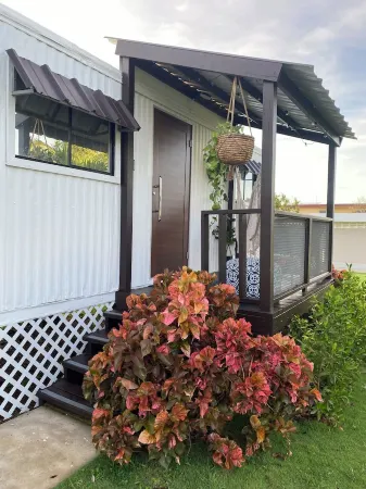 Cozy 2-bedroom apartment in charming Arecibo with WiFi, AC